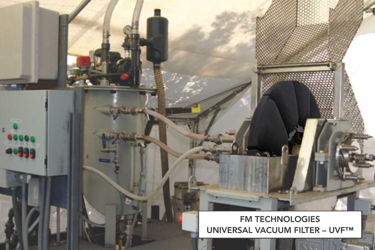 UVF Pilot Test Equipment Iron ore concentrate shown collected on UVF™ Vacuum Filter Disk pilot test equipment.